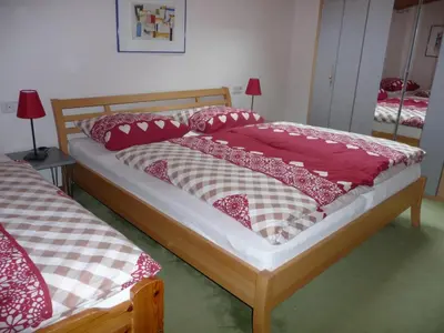 Ein Bett oder Betten in einem Zimmer der Unterkunft Ferienwohnung Hans Ebner