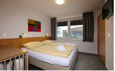 Ein Bett oder Betten in einem Zimmer der Unterkunft Schraberger - Top ALPIN AMORE