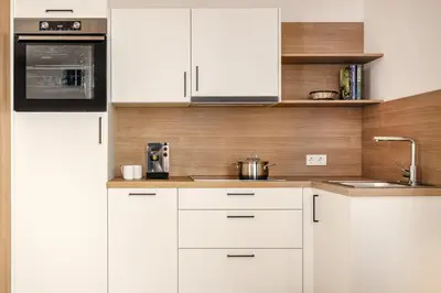 Küche/Küchenzeile in der Unterkunft MANGGEI-BAU Appartements und Studios