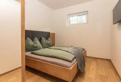 Ein Bett oder Betten in einem Zimmer der Unterkunft neues Studio Appartement M&M