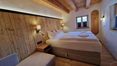 Ein Bett oder Betten in einem Zimmer der Unterkunft Alm Chalet Grosseck