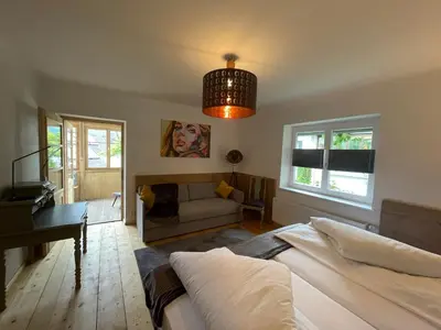 Ein Bett oder Betten in einem Zimmer der Unterkunft am Kalvarienberg Villenapartment & Hostel Bad Ischl