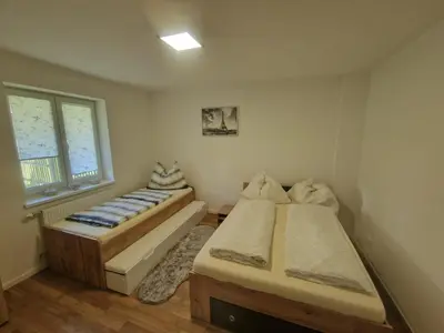 Ein Bett oder Betten in einem Zimmer der Unterkunft Apartment Emma
