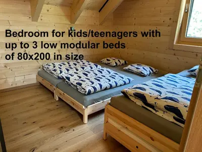 Ein Bett oder Betten in einem Zimmer der Unterkunft Das Grünhaus - Dein Chalet in Grünau im Almtal