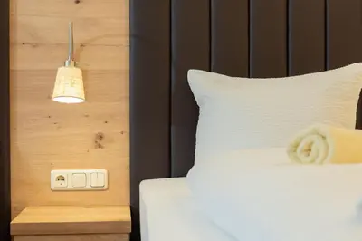 Ein Bett oder Betten in einem Zimmer der Unterkunft Appartement Mühlkogel mit Indoorpool und Sauna