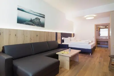 Ein Bett oder Betten in einem Zimmer der Unterkunft Appartement Mühlkogel mit Indoorpool und Sauna