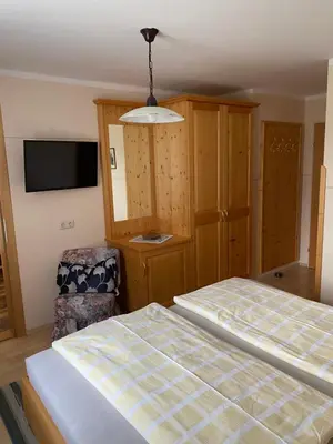 Ein Bett oder Betten in einem Zimmer der Unterkunft Maislbauer