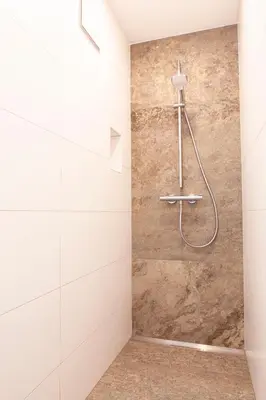 Ein Badezimmer in der Unterkunft BachBett - modernes Gästehaus im Salzkammergut