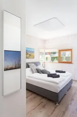 Ein Bett oder Betten in einem Zimmer der Unterkunft Designferienhaus Altenmarkt Zauchensee