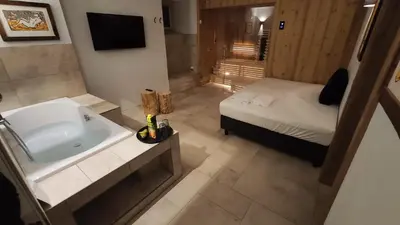 Ein Bett oder Betten in einem Zimmer der Unterkunft Burglodge Fischerkeusche