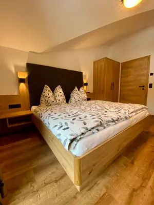 Ein Bett oder Betten in einem Zimmer der Unterkunft Finkhof Appartements