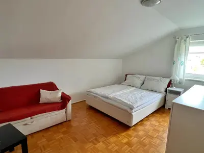 Ein Bett oder Betten in einem Zimmer der Unterkunft Ferienwohnung zum Entspannen