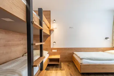 Ein Bett oder Betten in einem Zimmer der Unterkunft Hotel Moser
