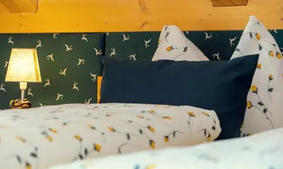Ein Bett oder Betten in einem Zimmer der Unterkunft Ferienwohnung Leuner