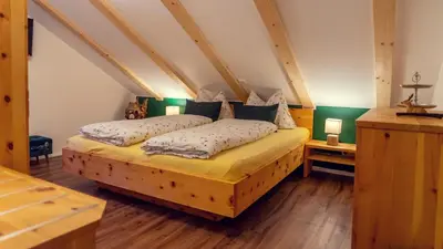 Ein Bett oder Betten in einem Zimmer der Unterkunft Ferienwohnung Leuner