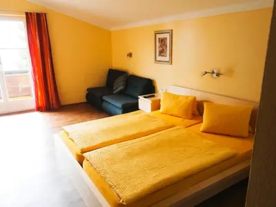 Ein Bett oder Betten in einem Zimmer der Unterkunft Pension Susi