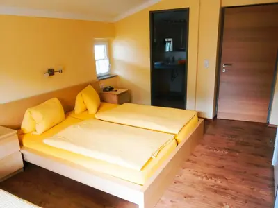 Ein Bett oder Betten in einem Zimmer der Unterkunft Pension Susi