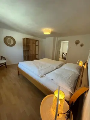 Ein Bett oder Betten in einem Zimmer der Unterkunft Boho Home am Bach