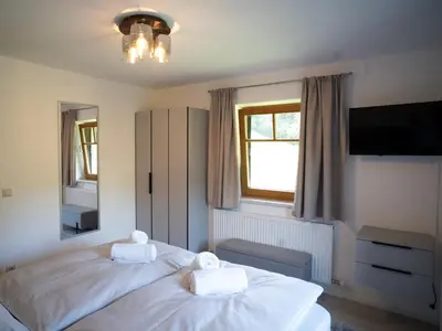 Ein Bett oder Betten in einem Zimmer der Unterkunft Apartment Bachweg