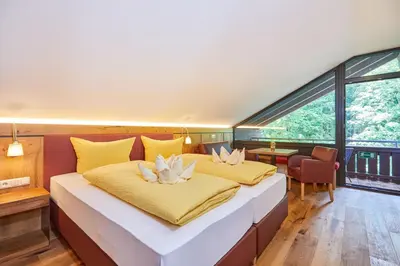 Ein Bett oder Betten in einem Zimmer der Unterkunft Appartement Loser mit Indoorpool und Sauna