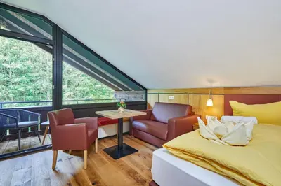 Ein Bett oder Betten in einem Zimmer der Unterkunft Appartement Loser mit Indoorpool und Sauna