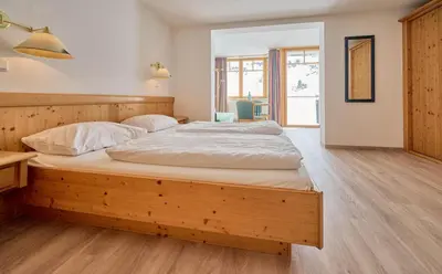 Ein Bett oder Betten in einem Zimmer der Unterkunft Heart Hotel Aurora