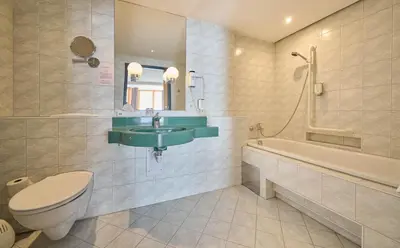 Ein Badezimmer in der Unterkunft Heart Hotel Aurora