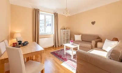 Ein Sitzbereich in der Unterkunft Apartments am Kurpark