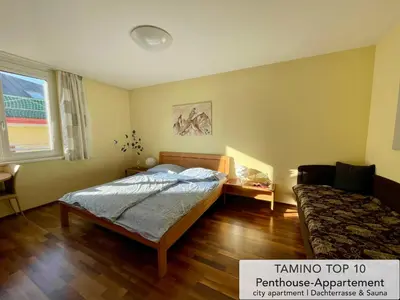 Ein Bett oder Betten in einem Zimmer der Unterkunft Penthouse TAMINO TOP 10