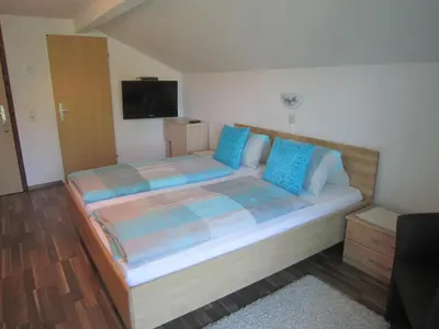 Ein Bett oder Betten in einem Zimmer der Unterkunft Frühstückspension Kibler