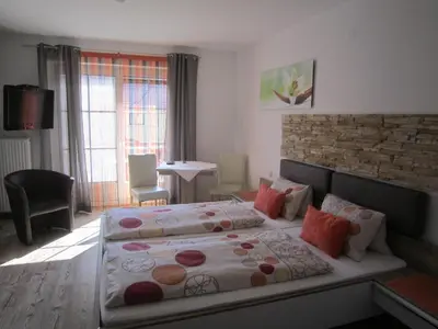Ein Bett oder Betten in einem Zimmer der Unterkunft Frühstückspension Kibler