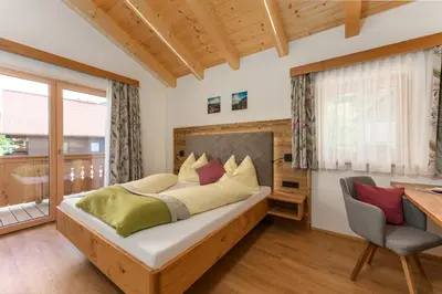 Ein Bett oder Betten in einem Zimmer der Unterkunft Apartments Haufhof , Haus im Ennstal bei Schladming