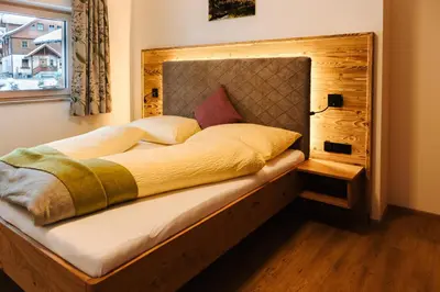 Ein Bett oder Betten in einem Zimmer der Unterkunft Apartments Haufhof , Haus im Ennstal bei Schladming