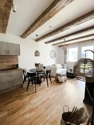 Ein Sitzbereich in der Unterkunft Bergzeit by Alpenidyll Apartments