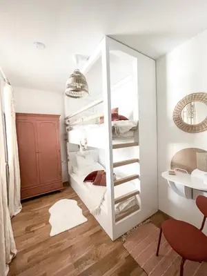 Ein Bett oder Betten in einem Zimmer der Unterkunft Bergzeit by Alpenidyll Apartments