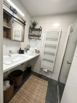 Ein Badezimmer in der Unterkunft Bergzeit by Alpenidyll Apartments