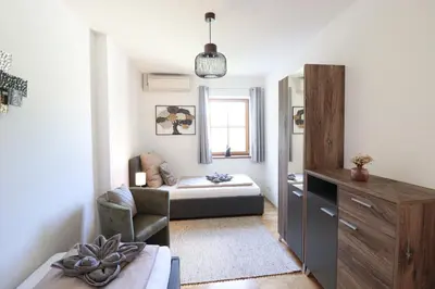 Ein Bett oder Betten in einem Zimmer der Unterkunft Naturtalente Berghaus - Apartment 4
