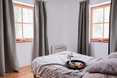 Ein Bett oder Betten in einem Zimmer der Unterkunft Naturtalente Berghaus - Apartment 3