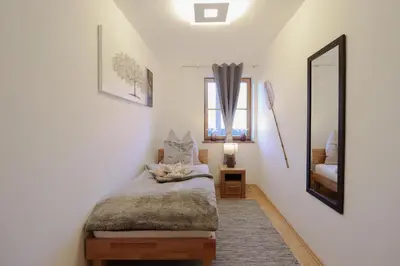 Ein Bett oder Betten in einem Zimmer der Unterkunft Naturtalente Berghaus - Apartment 2