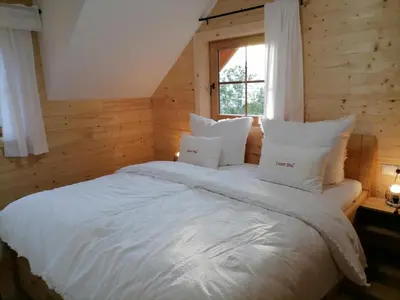 Ein Bett oder Betten in einem Zimmer der Unterkunft Lärchenhaus ,,Unterer Brodl