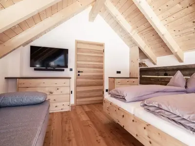 Ein Bett oder Betten in einem Zimmer der Unterkunft Haus 1683 - Wolfbauer