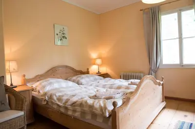 Ein Bett oder Betten in einem Zimmer der Unterkunft Waldhaus Ahornau Chalet