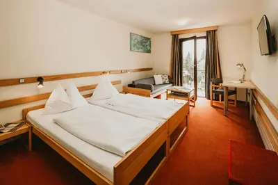 Ein Bett oder Betten in einem Zimmer der Unterkunft Hotel Kernwirt