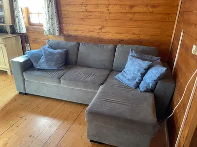 Ein Sitzbereich in der Unterkunft Ferienhaus Bettina Rassis Feriendorf Donnersbachwald