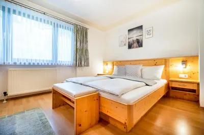 Ein Bett oder Betten in einem Zimmer der Unterkunft Haus Gumpold 2