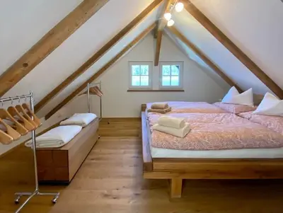 Ein Bett oder Betten in einem Zimmer der Unterkunft Seegut Steeg am Hallstättersee