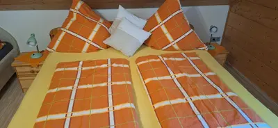 Ein Bett oder Betten in einem Zimmer der Unterkunft Ferienwohnung Ingrid