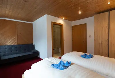 Ein Bett oder Betten in einem Zimmer der Unterkunft Hotel Pension Kandolf
