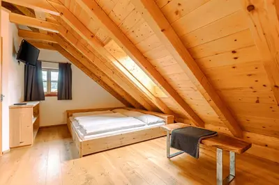 Ein Bett oder Betten in einem Zimmer der Unterkunft Hochgolling Loft