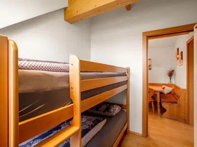 Ein Bett oder Betten in einem Zimmer der Unterkunft Apartment Top 13 by Interhome